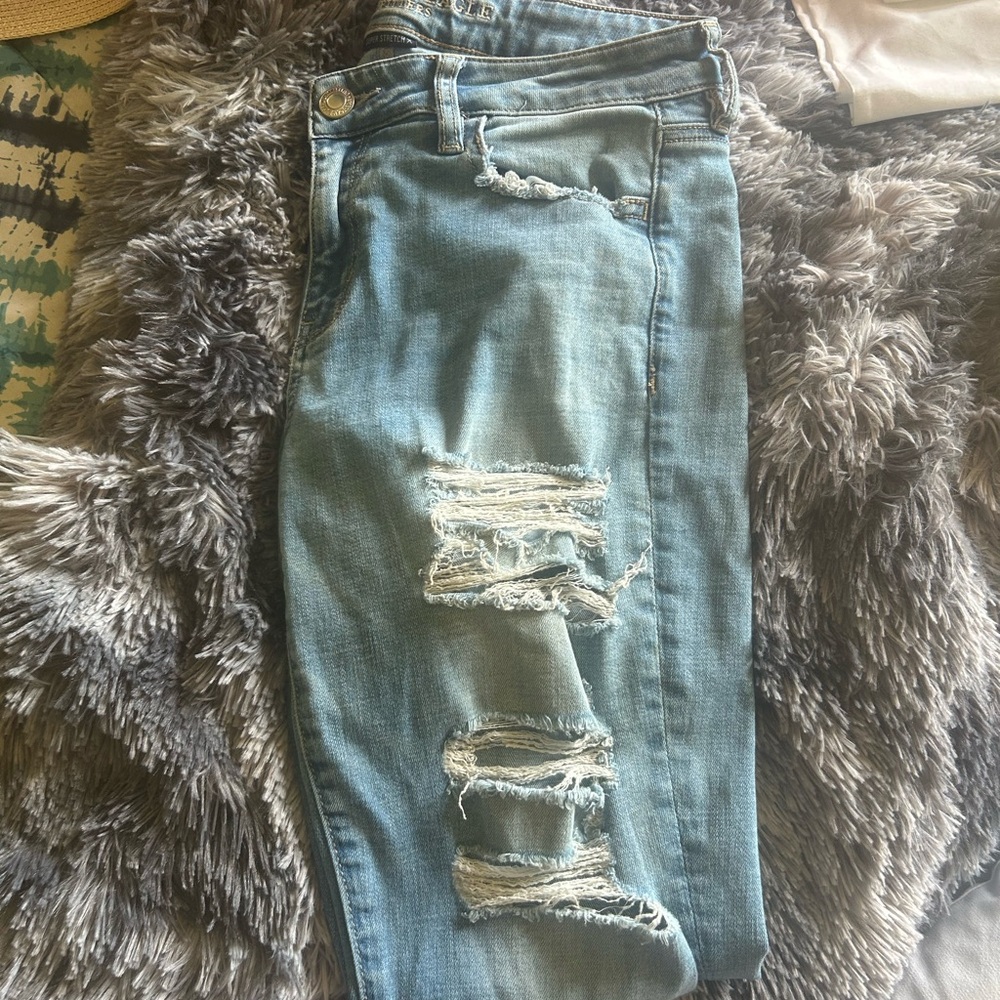 Distressed Blue Jeans